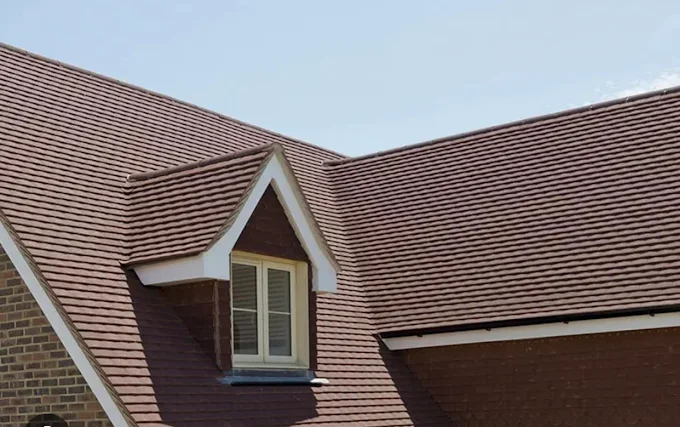 Brown tiled dormer with clean rooflines